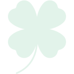 Four-leaf clover silhouette on black background.